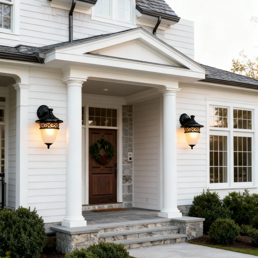 Vintage wall lights outdoor mounted on modern home facade during dusk.