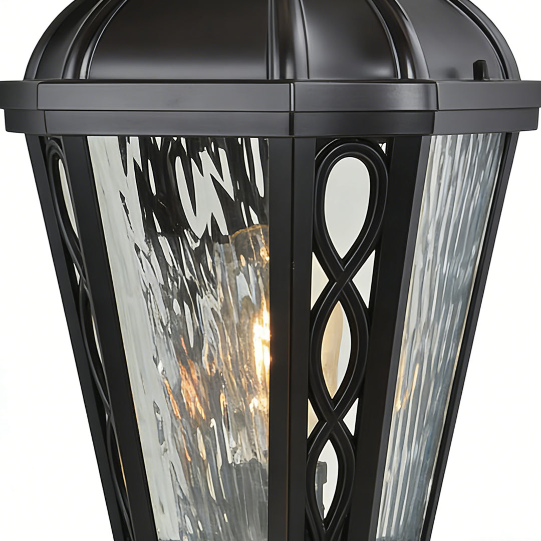 Modern black post light featuring intricate glass patterns and sleek frame, ideal for stylish outdoor driveway illumination.