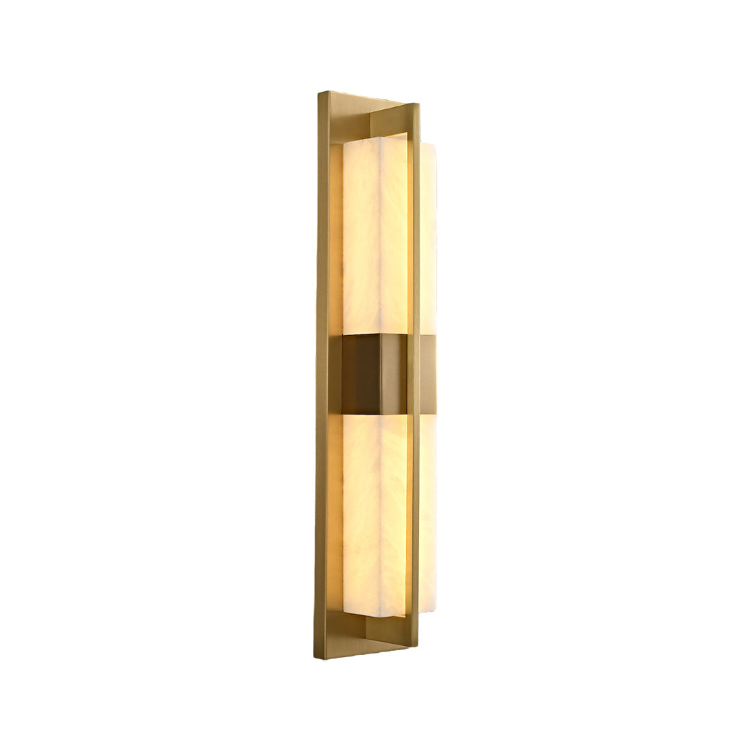 Modern linear gold wall lighting fixture with a warm glow isolated on a white studio background