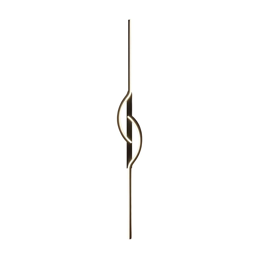 Modern linear wall sconce installed beside an accent chair in a luxury interior.