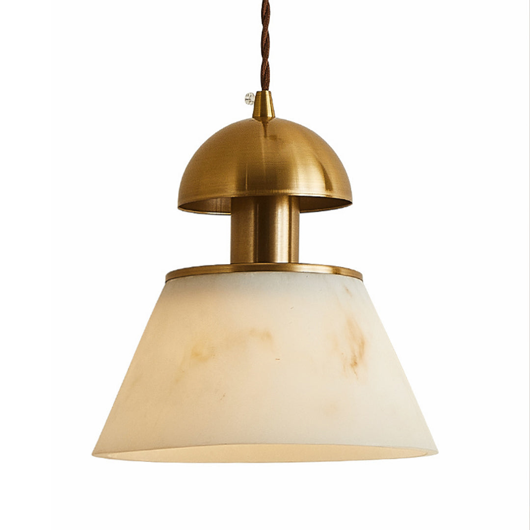 Modern metallic pendant lights featuring polished brass cap with frosted white glass shade in elegant form
