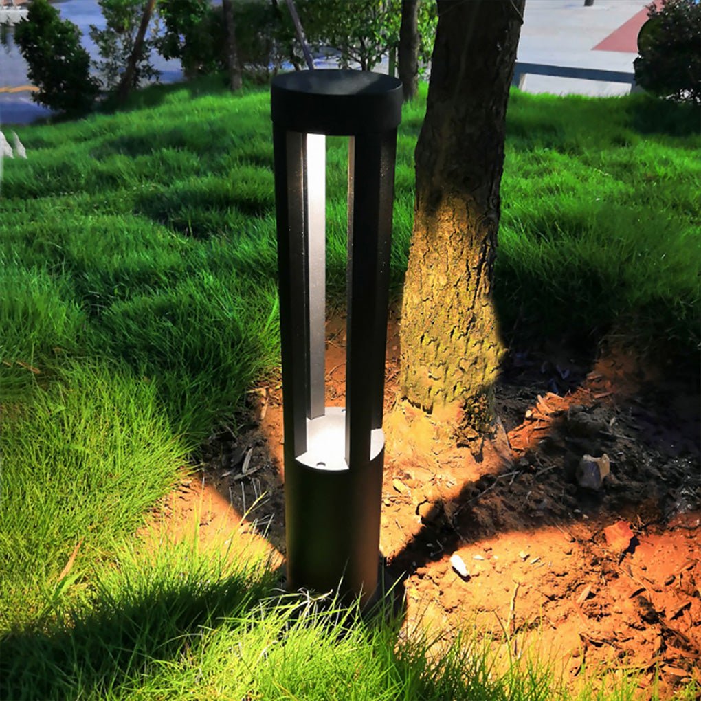 Modern outdoor bollard lights with a close-up of the rectangular light fixture.
