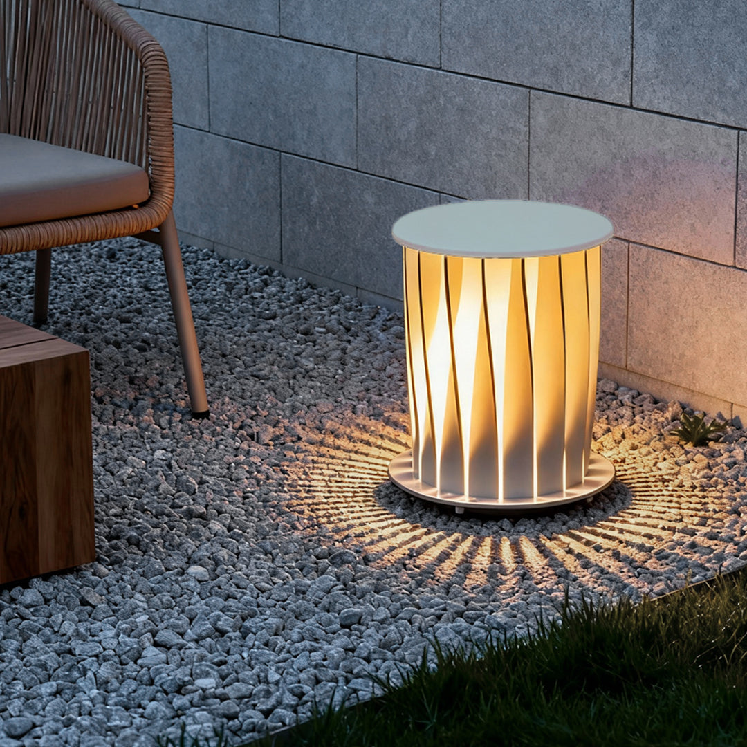 Minimalist modern outdoor lanterns placed in the corner providing vertical accent lighting.