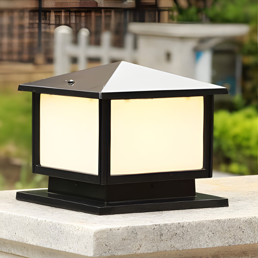 Solar-style modern outdoor pillar lights on a stone pillar, featuring a flat top and soft diffused lighting for pathways.