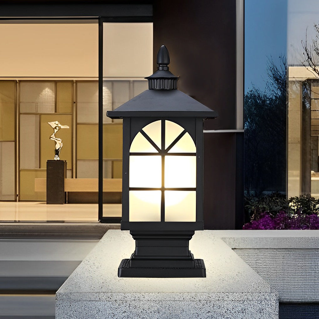 Modern outdoor street light pillar mounted near contemporary home entrance.