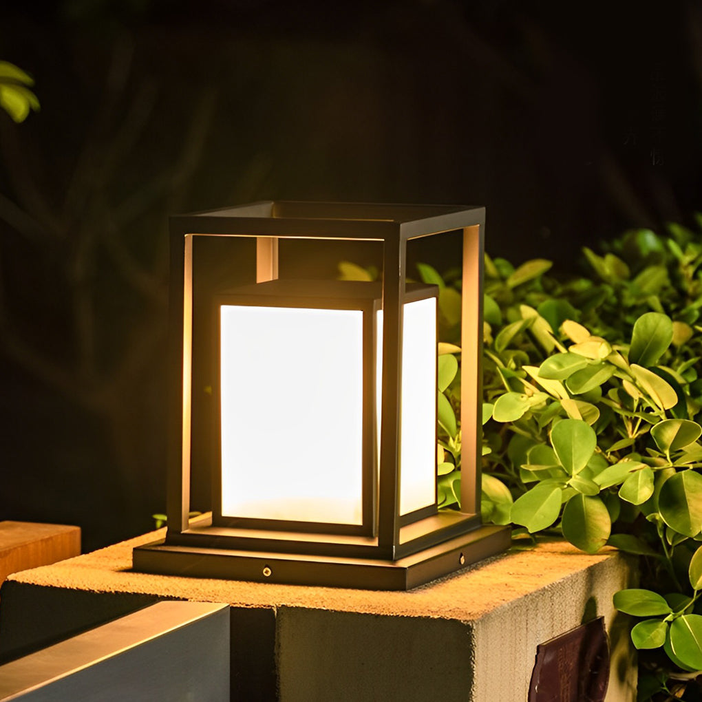 Modern outdoor wall pillar lights glowing softly on balcony edge surrounded by greenery.