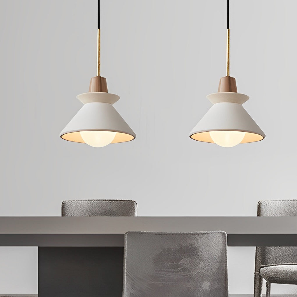 Modern oval bulkhead wall light with warm glow installed on a minimalist exterior wall.