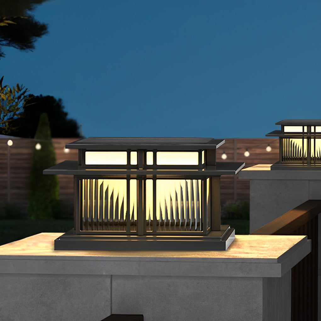Modern porch pillar lights with horizontal slat design placed on a concrete column at dusk.