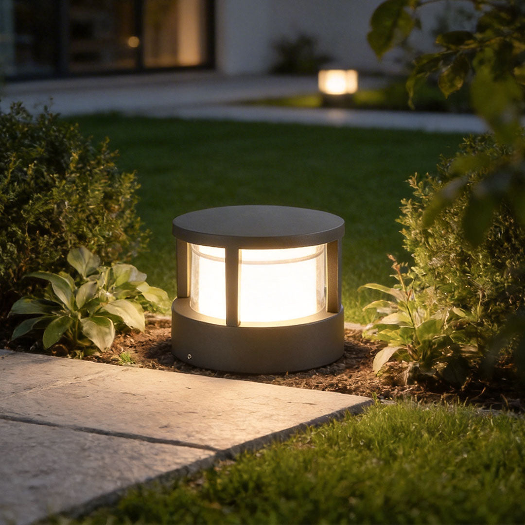 Modern round outdoor post light provides stylish and durable LED illumination for gardens, pathways, and patios.
