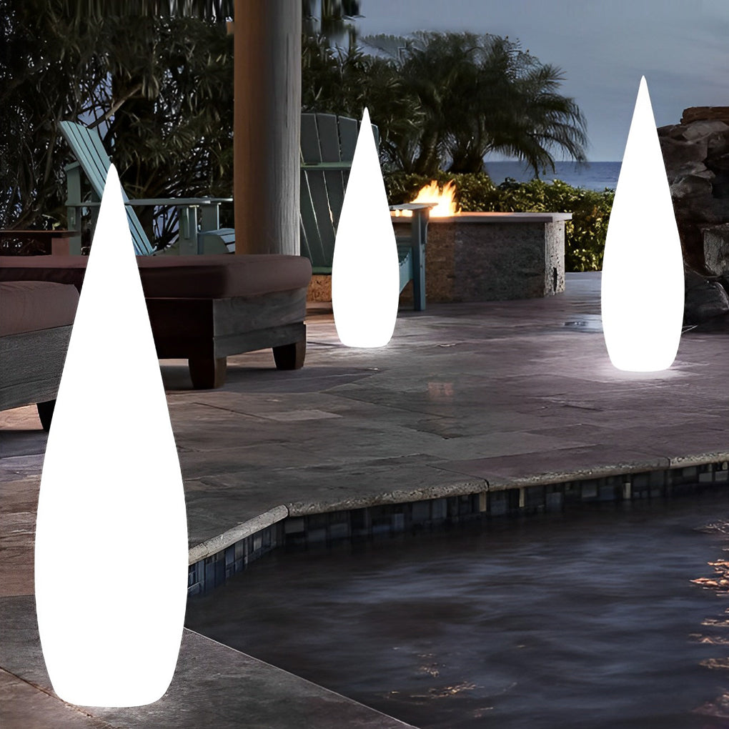 Modern teardrop outdoor light with smooth matte finish in modern exterior setting.