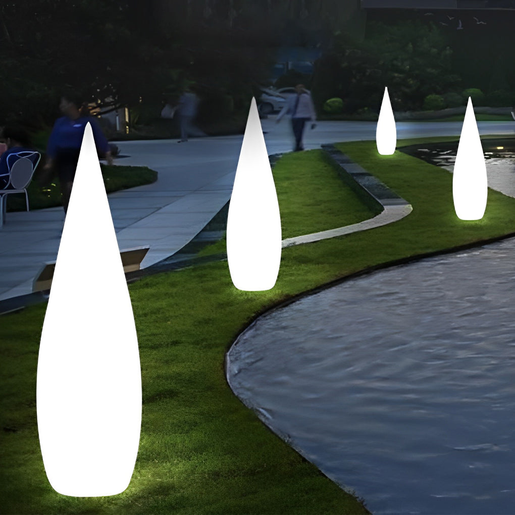 Modern teardrop outdoor light with soft white glow for pathway decoration.