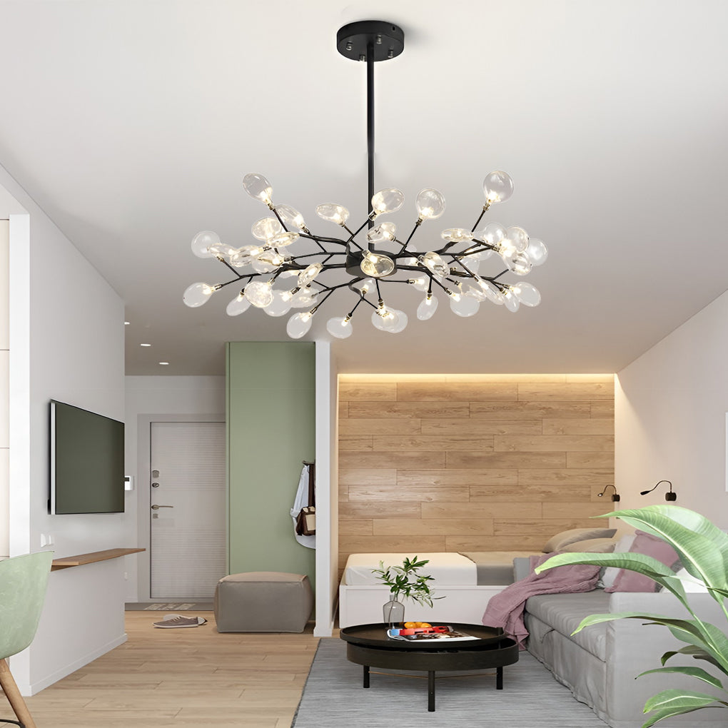 Modern tree branch chandelier casting a gentle glow in a stylish modern bedroom.