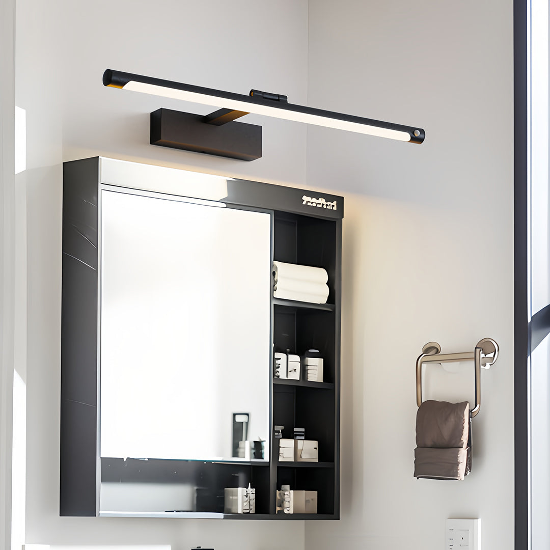 Modern bathroom vanity light mounted over contemporary bathroom mirror with black frame accent