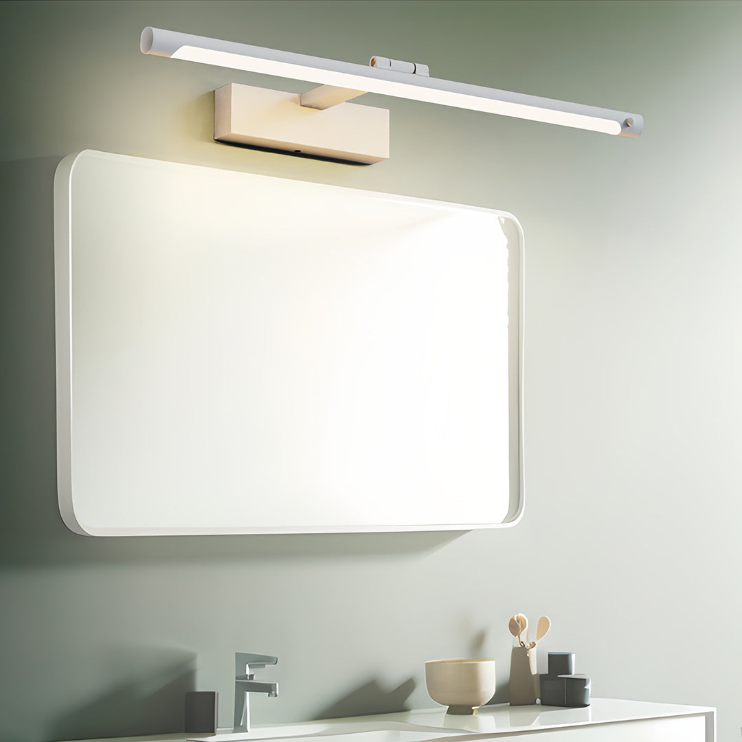 Modern bathroom vanity light providing task lighting in elegant bathroom with white cabinet vanity