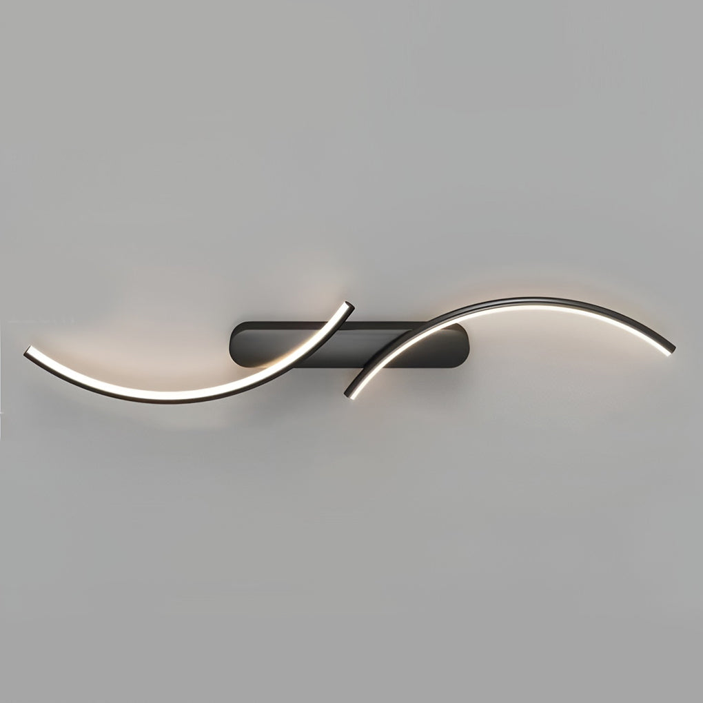 Modern wave wall sconce enhancing a minimalist bedroom with warm light.