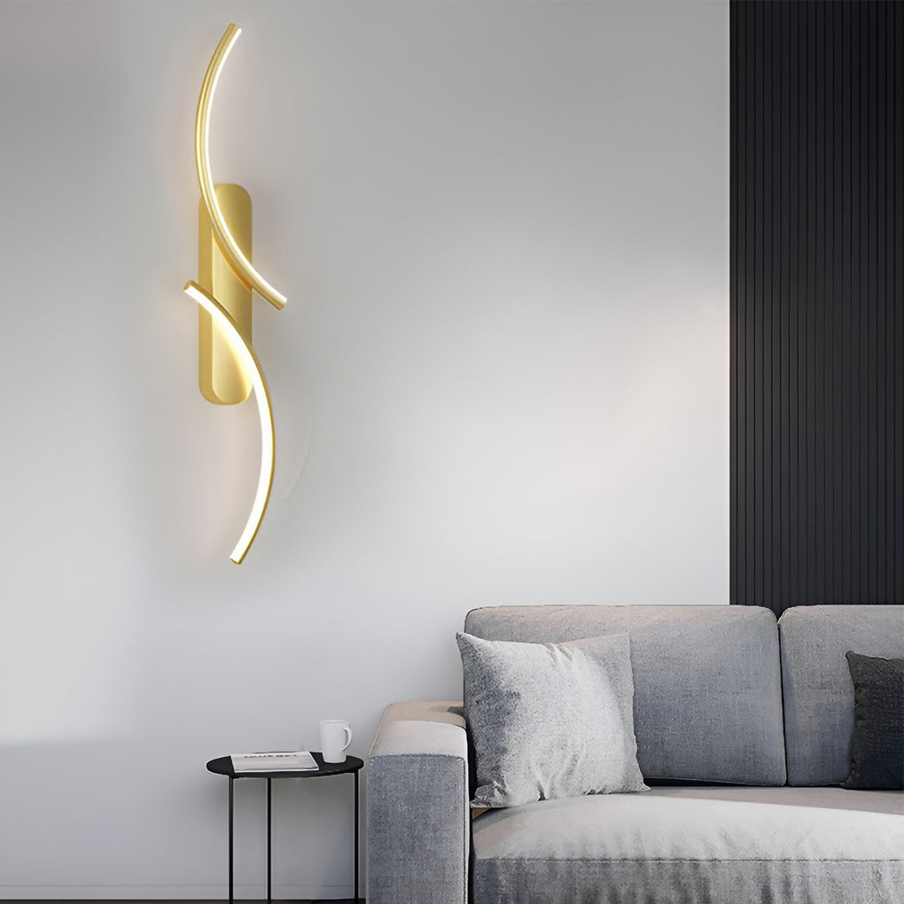 Modern wave wall sconce illuminating a modern sofa area with artistic ambiance.
