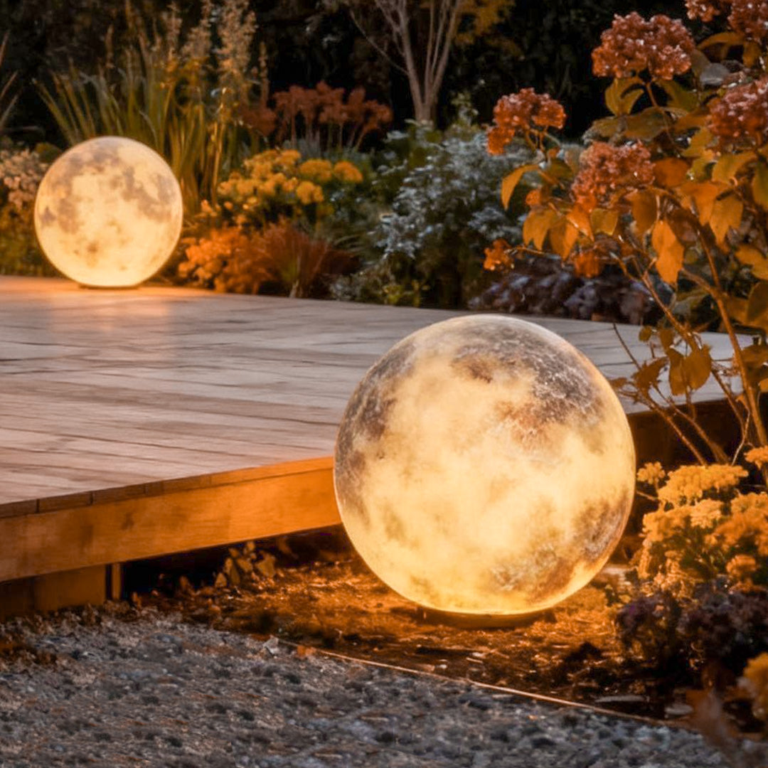 Moon light placed beside a wooden patio deck outdoors.