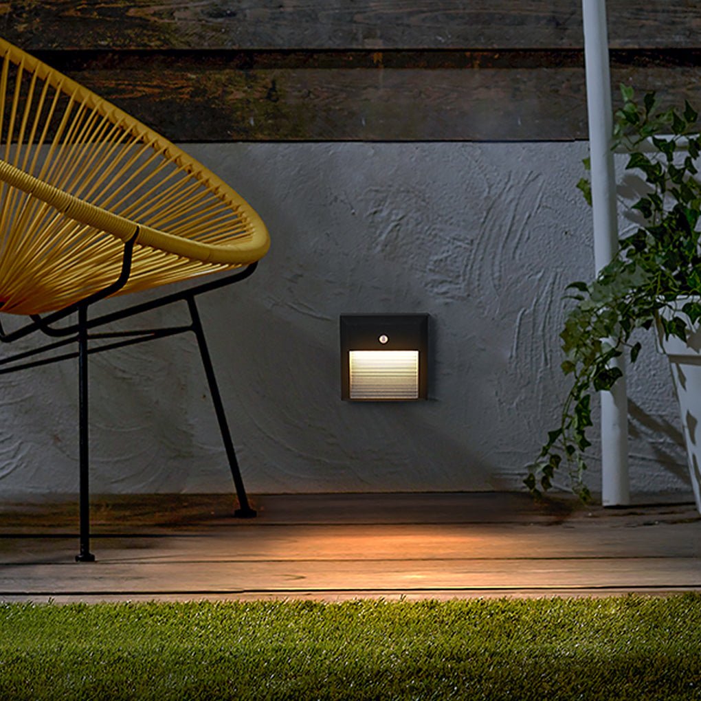 Motion sensor LED step lights enhancing a patio with subtle, automatic lighting.