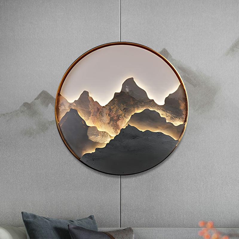 Mountain LED wall light front view showing circular frame and lighting effect