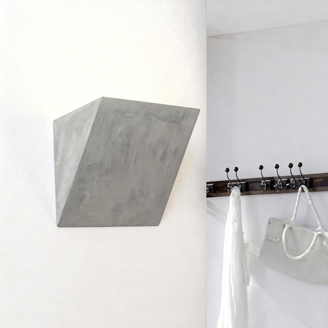 Pair of night wall lights with flared ceramic design flanking modern bathroom vanity mirror