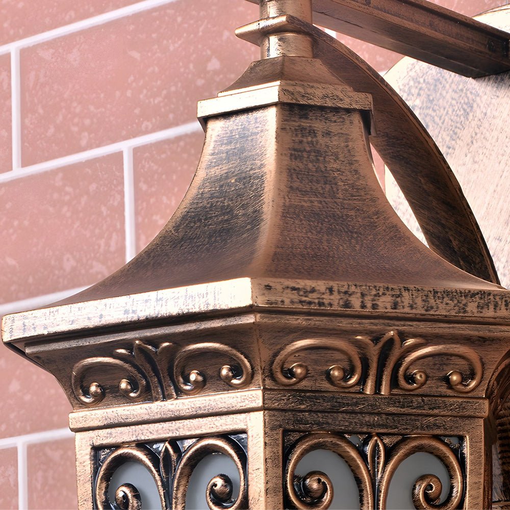 Antique art deco wall sconces with ornate bronze latticework, emphasizing intricate patterns and vintage charm.
