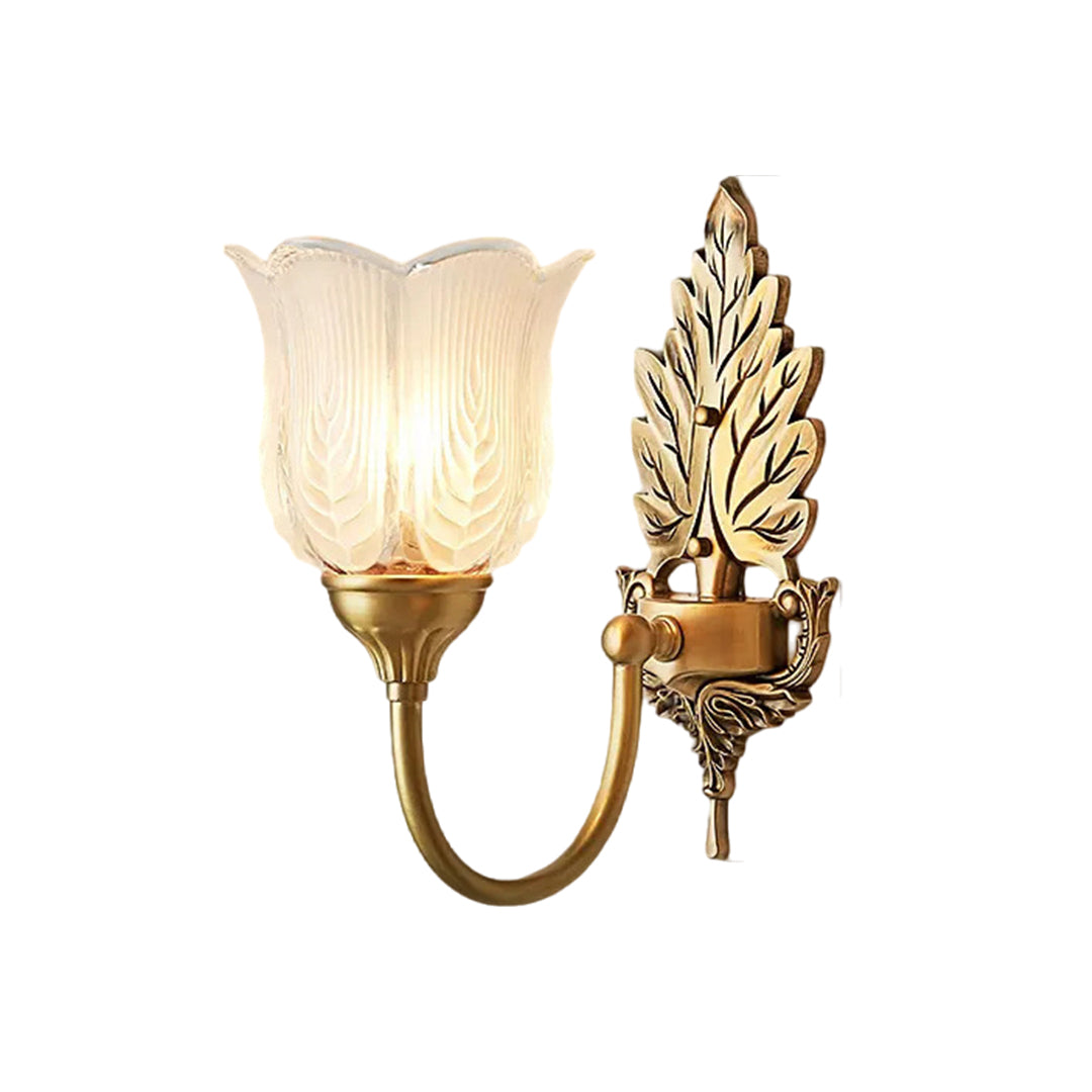 Classic brass wall light featuring ornate leaf design and frosted glass shade for ambient lighting