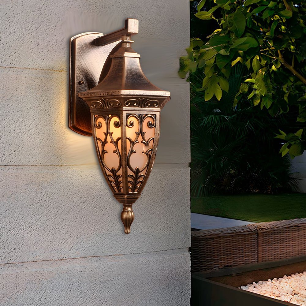 Outdoor antique art deco wall sconces in bronze, highlighting intricate patterns and warm light on a modern facade.outdoor-antique-art-deco-wall-sconces-bronze-modern-facade
