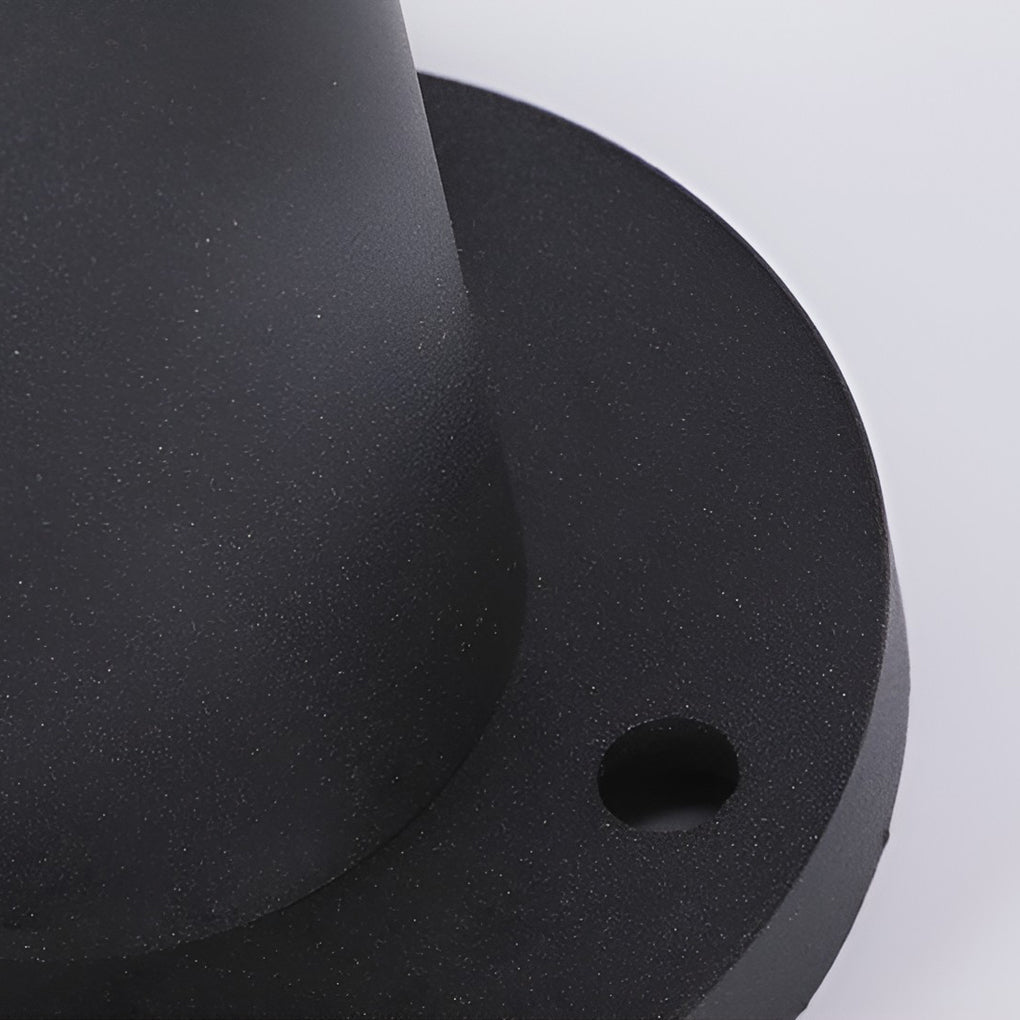 Outdoor bollards lighting with detailed view of its top and light diffusion.