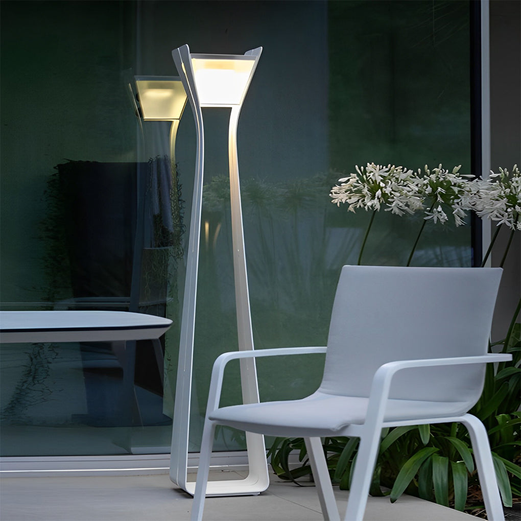 Outdoor floor lamps for porches near patio seating, enhancing comfort and visibility in modern outdoor lounges.