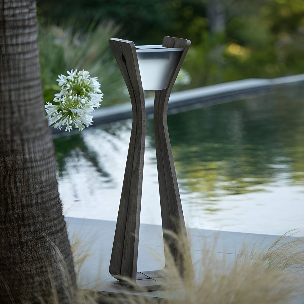 Outdoor floor lamps for porches beside a poolside area, combining sculptural design with functional outdoor illumination.