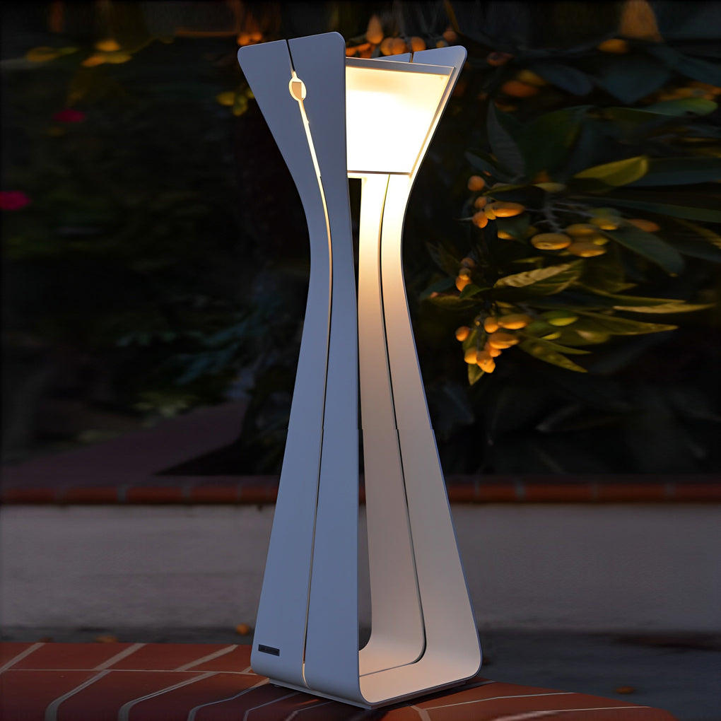 Single outdoor floor lamp for porches shown at night, highlighting its tall sculptural form and warm light output.