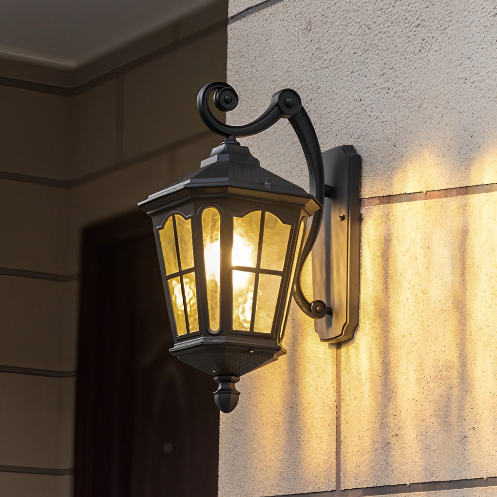 Outdoor front porch lights with a black finish, providing ambient light near a door.