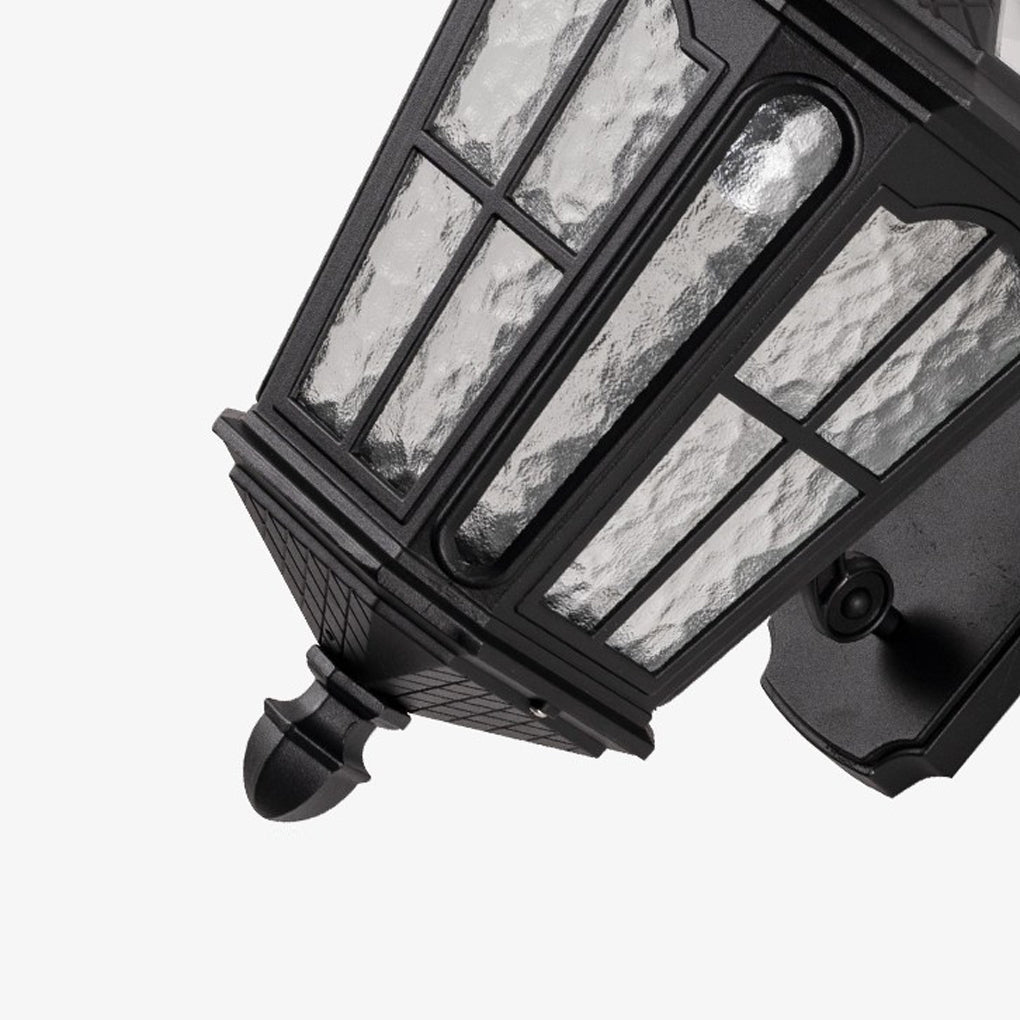 Outdoor front porch lights with a modern design, providing soft illumination on a porch.