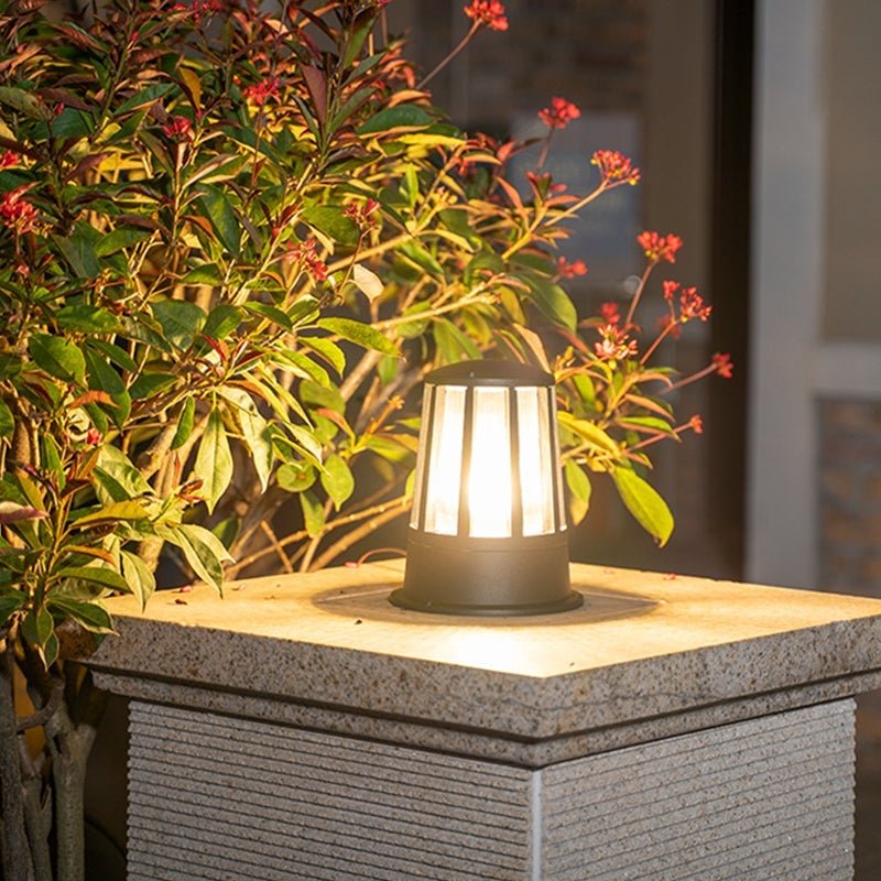 Outdoor garden path lamp enhancing a lush garden pathway with soft glow.