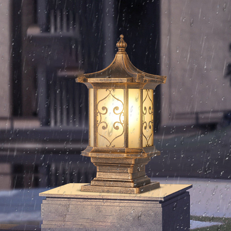Outdoor gate pillar lights during rainfall, showcasing weather-resistant design and warm light.