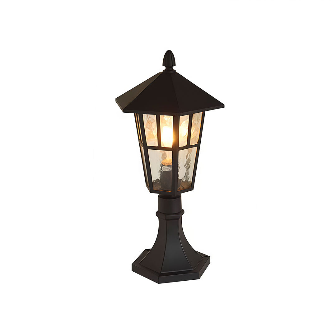 Outdoor landscape path lighting with a solar panel, mounted on a garden pillar.