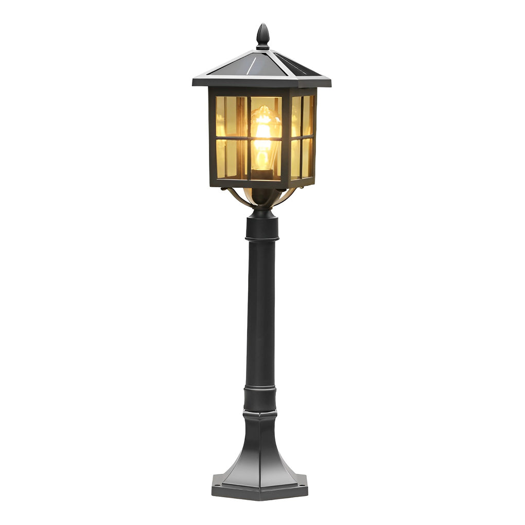 Outdoor lawn lights with a close-up of their light bulb and ornate design.