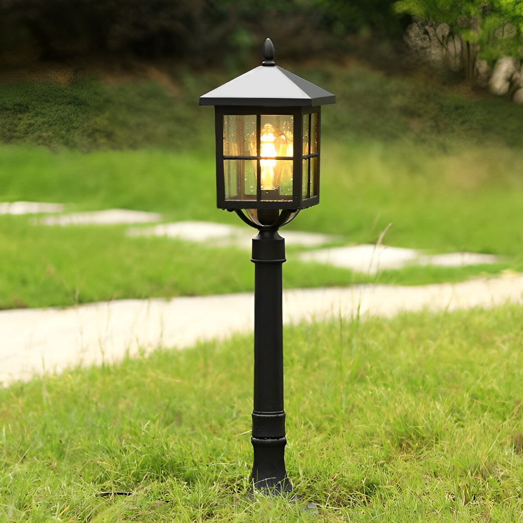 Outdoor lawn lights with a close-up of their solar panel and durable construction.