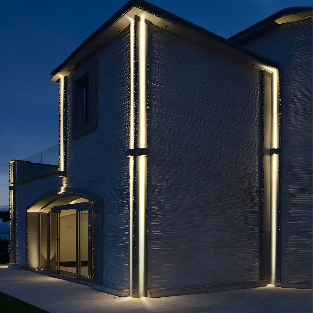 Outdoor narrow beam wall light used along pathway walls for subtle architectural accent lighting.