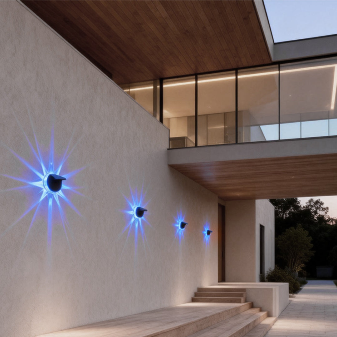 Outdoor patio solar lights illuminating a contemporary house exterior, enhancing curb appeal with warm, solar-powered glow.