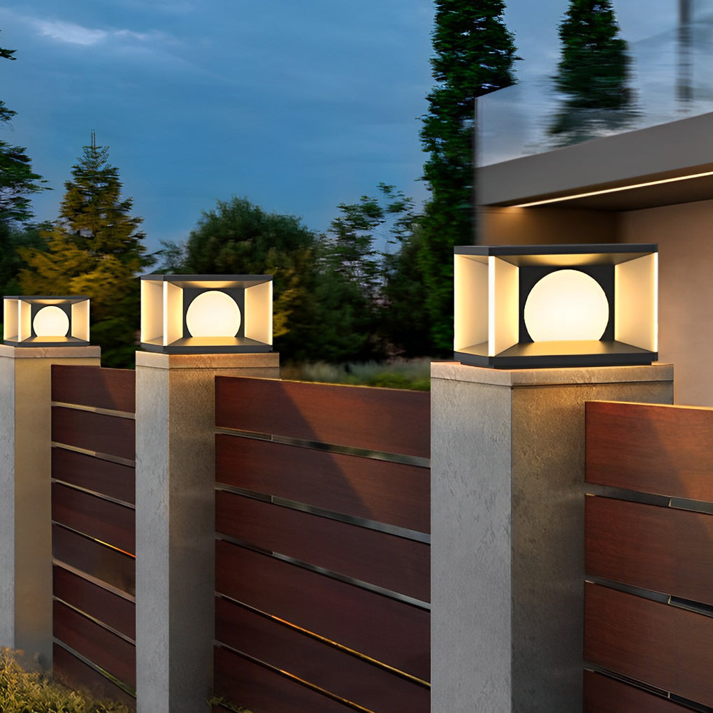 Outdoor pillar light illuminating a minimalist outdoor deck with focused glow.