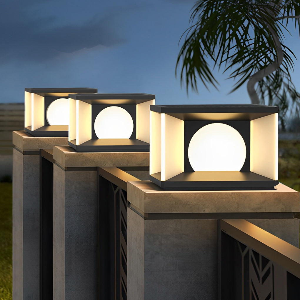 Outdoor pillar light providing soft illumination along a stylish outdoor walkway.