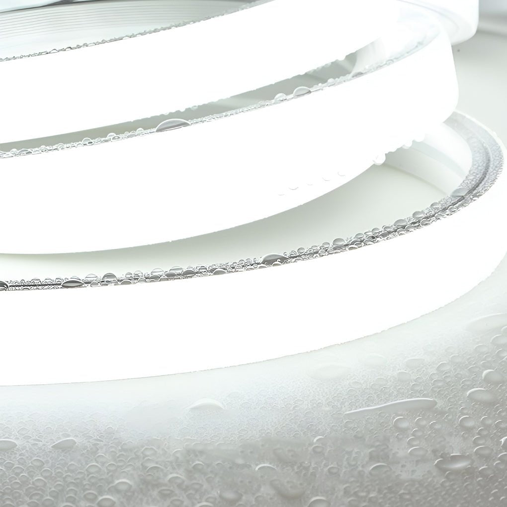 Outdoor stair lighting strips with a close-up of the illuminated spiral design.