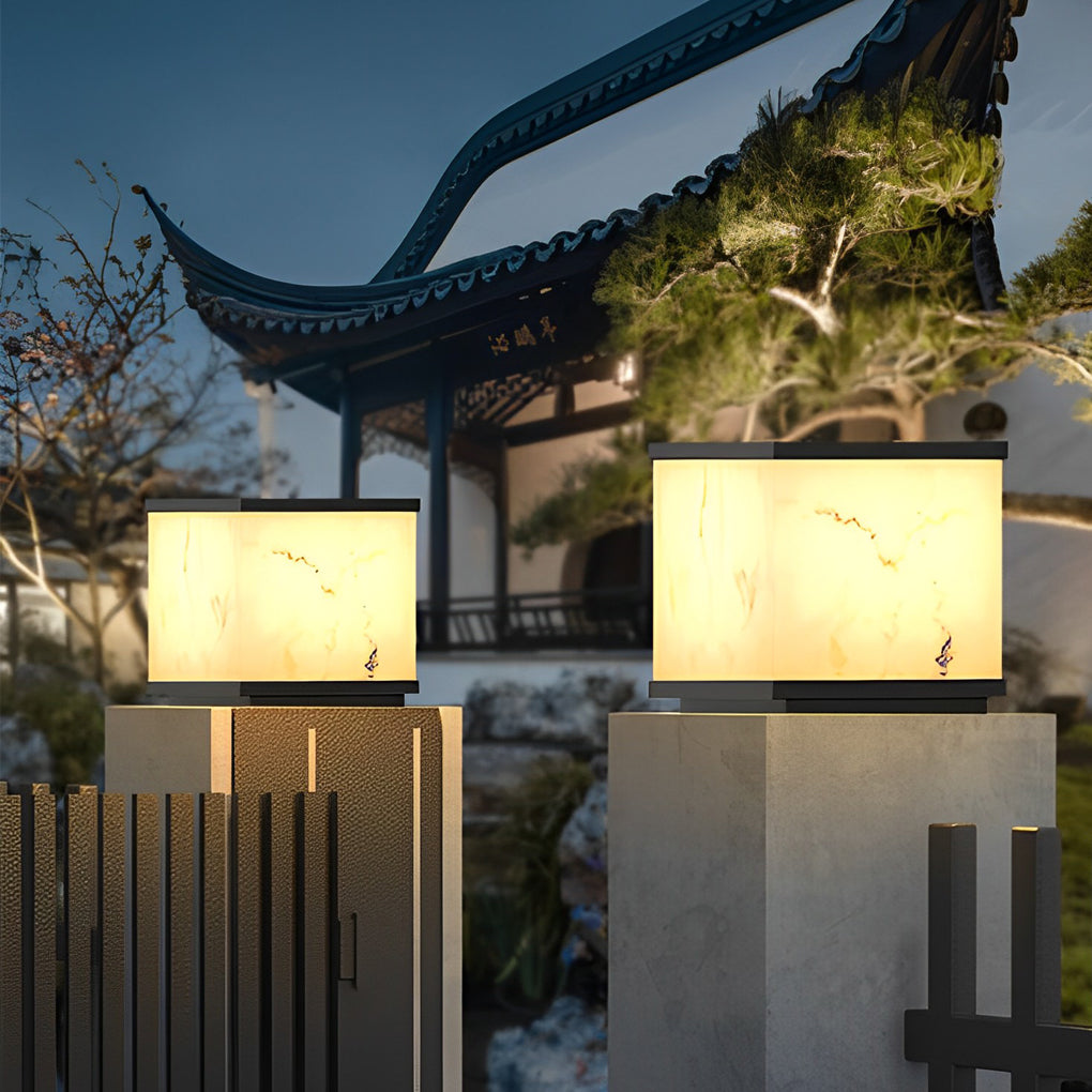 outdoor-stone-pillar-lights-garden-fence-soft-illumination-tranquil-evening