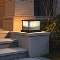 Outdoor stone pillar lights illuminating a set of stone steps, adding elegance to the garden entrance.