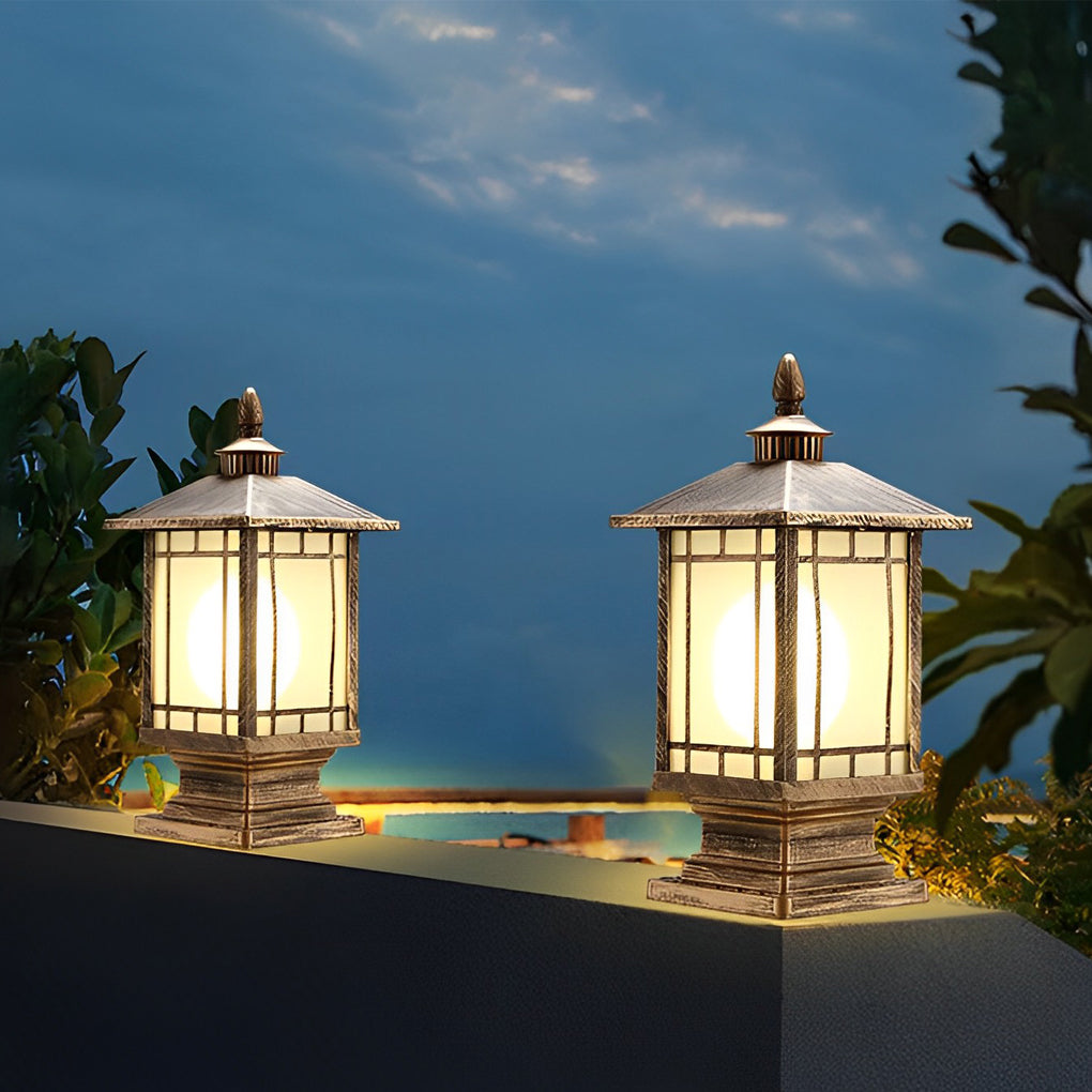 Pair of outdoor street light pillars installed on balcony railing at dusk.
