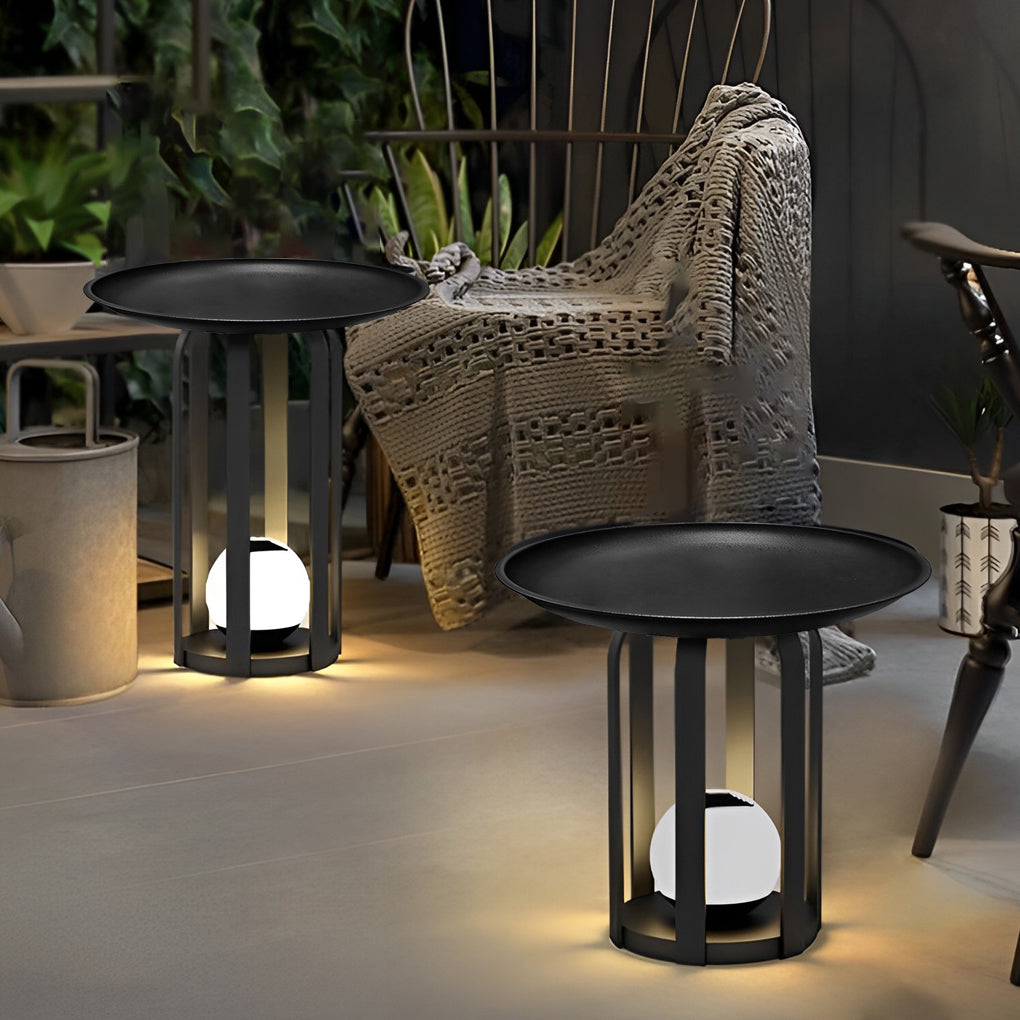 Outdoor tray floor lamp with a minimalist design, installed on a patio.