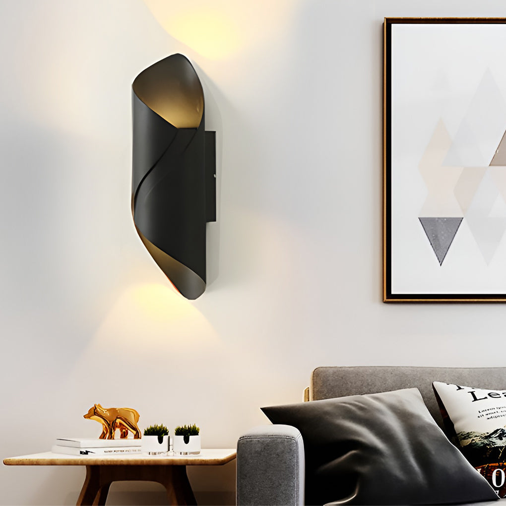 Outdoor up down wall light with black and gold finish, enhancing modern living room.