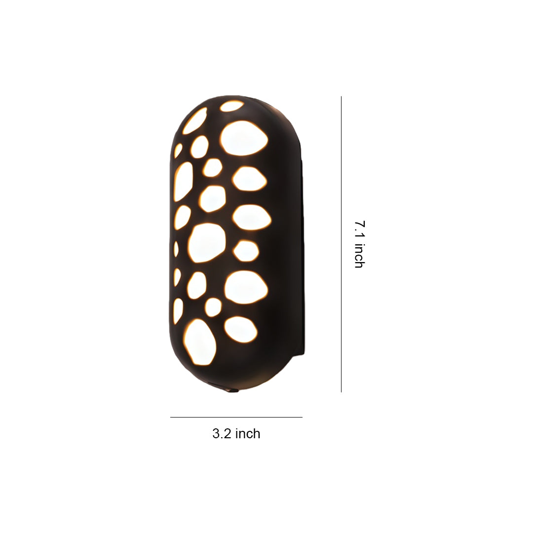 Outdoor up down wall lights with glass shade chandelier inspired design featuring modern black fixture with circular cutout pattern.
