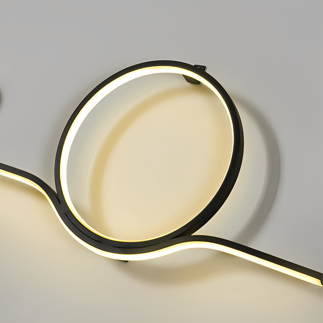 Close up of circular LED detail on contemporary outdoor wall lights.